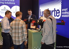 Sebastian of Drohne Agrar Service in the booth of Lumiforte. He's an enthousiast entrepeneur in Germany. Call him to coat your greenhouse with a drone.